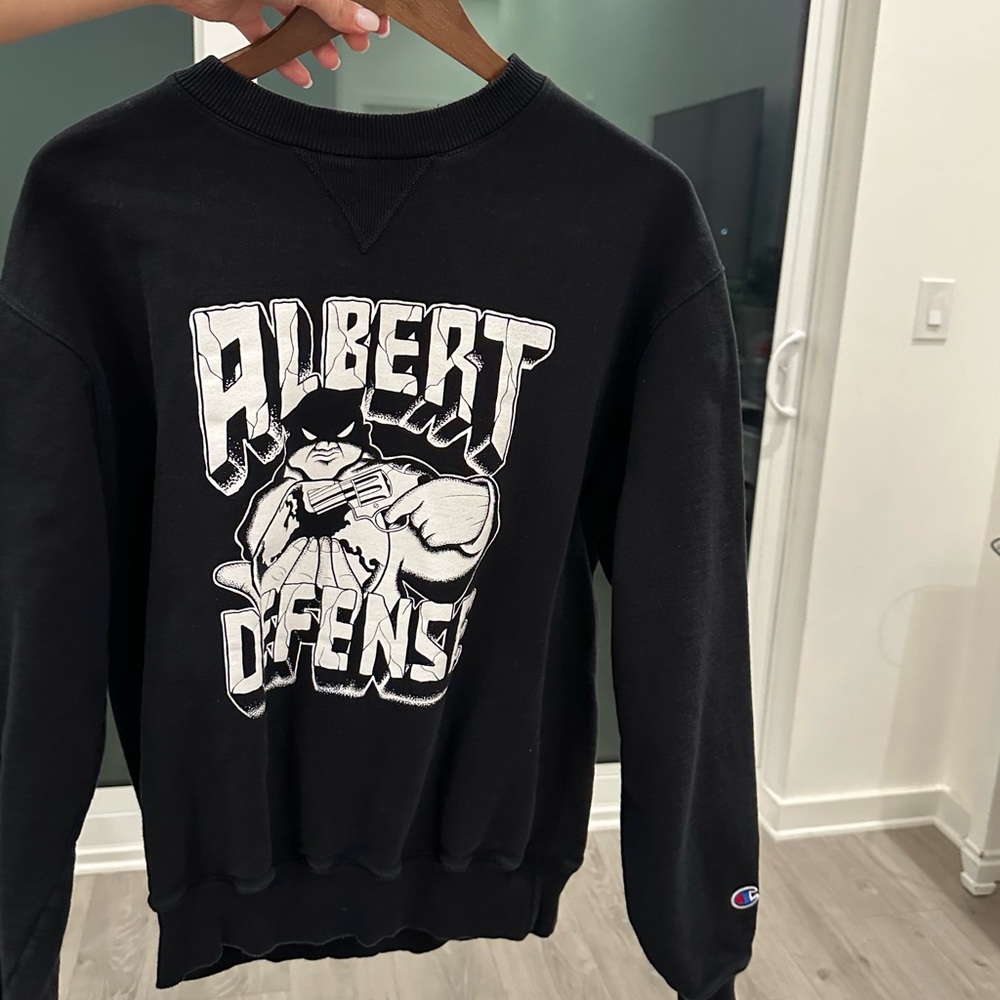 Albert defense sweater